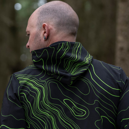 Man facing away from the camera wearing the MTB Enduro Jacket showing the hood