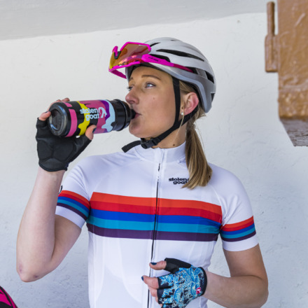 cyclist drinking from a water bottle