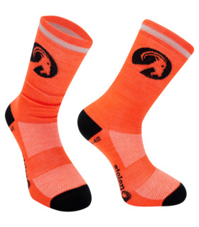Stolen Goat Orange merino sock, bright orange block colour sock with black heel and toe, black stolen goat logo and slogan on the sole and black round goat head logo on the ankle