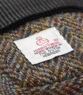 Close up of authentic Harris Tweed label on saddle bag