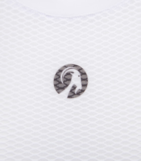 Close up of round goat head logo on women's Vulcan white mesh base layer