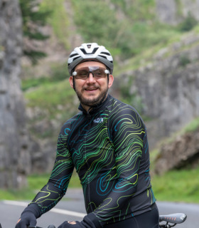 Man at Cheddar Gorge wearing Pioneer jersey
