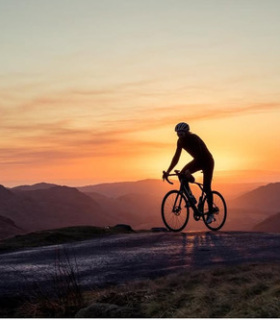 Kev Merrey cycling sunset